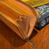 [Persimmon tangy dyed] <br>Round zip long <Standard>