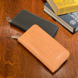 [Persimmon tangy dyed] <br>Round zip long <Standard>