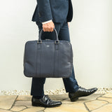 [Sustainable shrink leather] <br>briefcase<br>color: navy